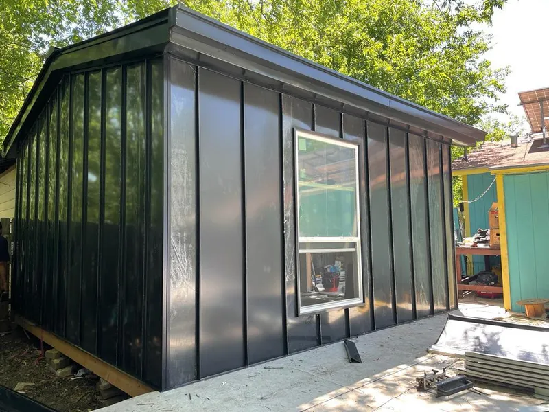 Black standing seam metal wall panels for Metal Roof Installation in North Fair Oaks