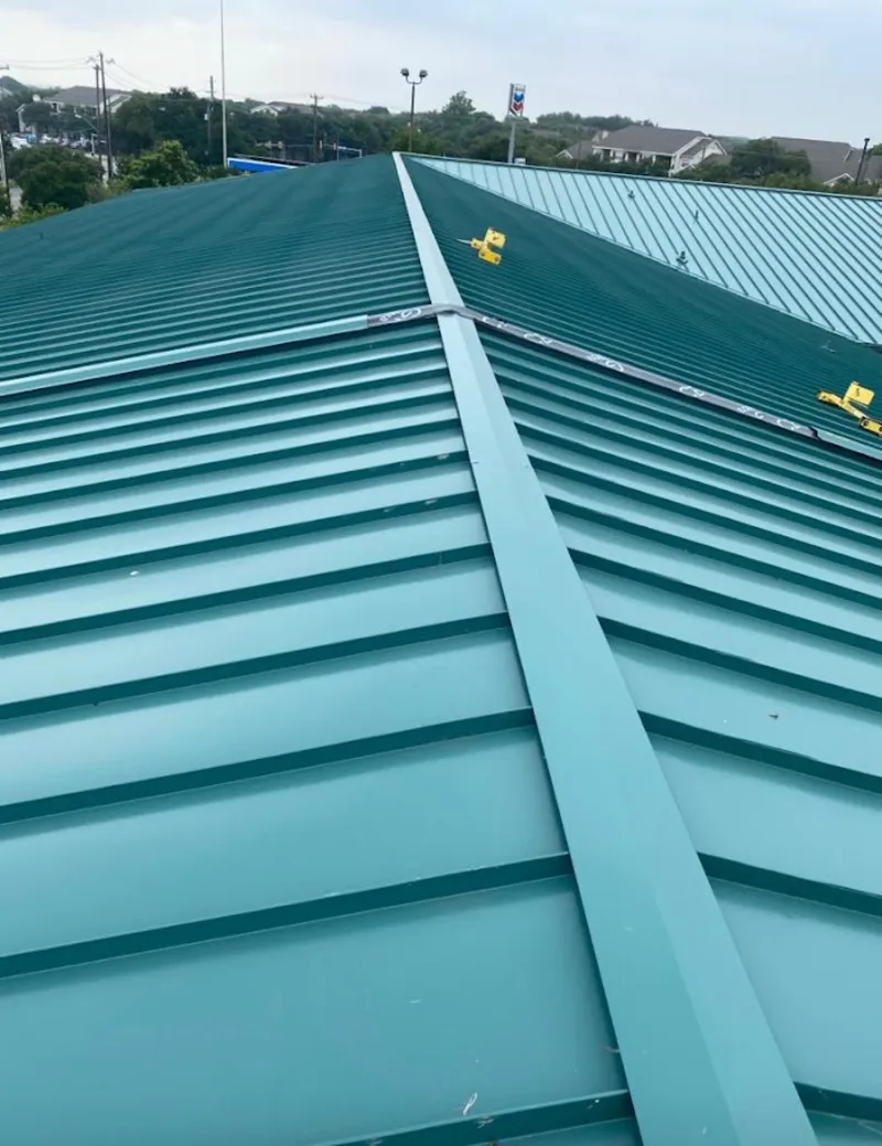 Green commercial metal roof ridge and valley for Metal Roof Repair in North Fair Oaks